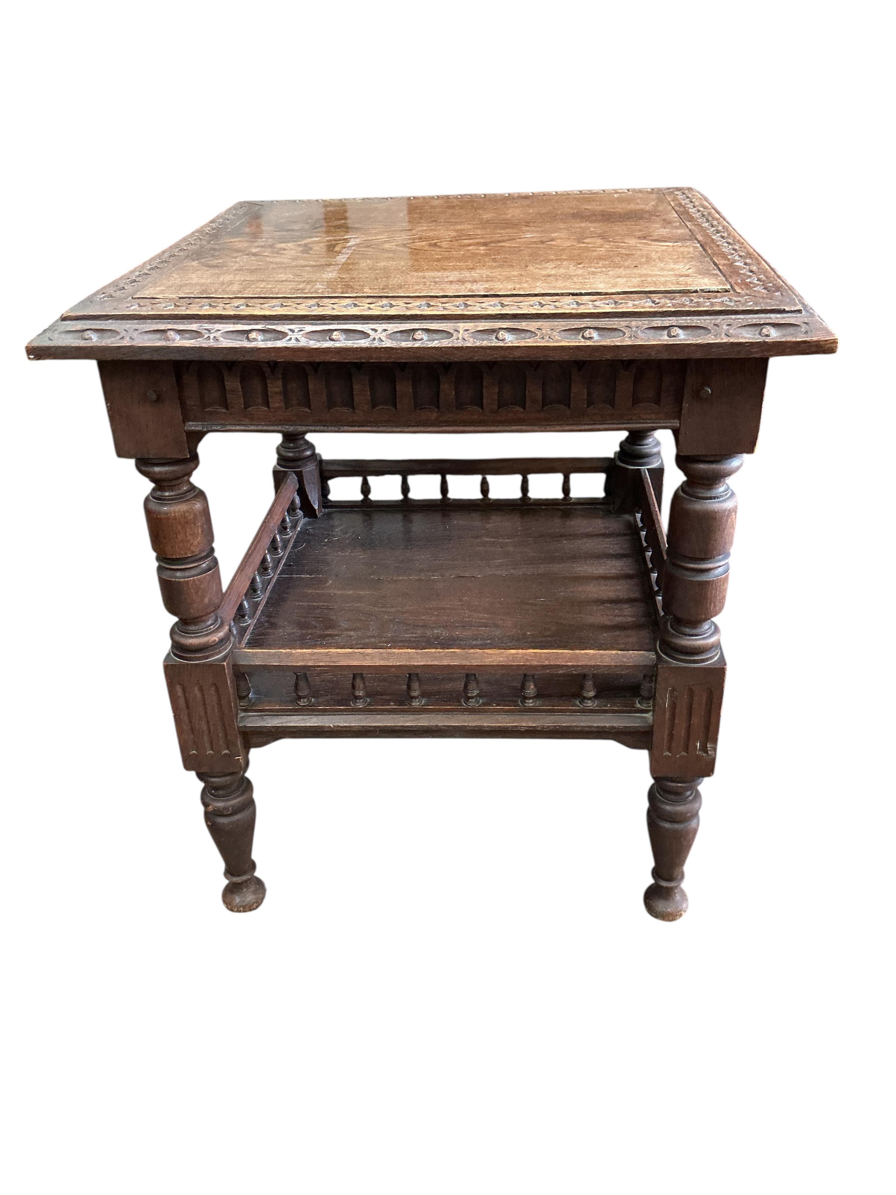 A late Victorian carved oak square two tier table, 59cm, height 66cm, together with a Victorian piano stool, a wall bracket and a Balinese wall mirror